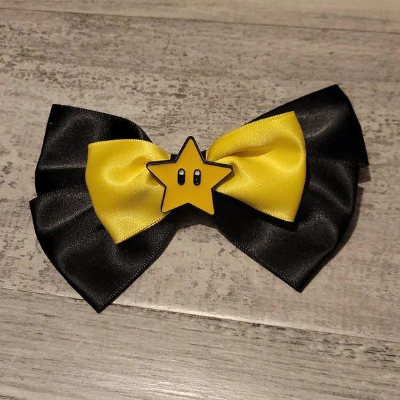 Nintendo Star Bow or Pin - Picture 1 of 3